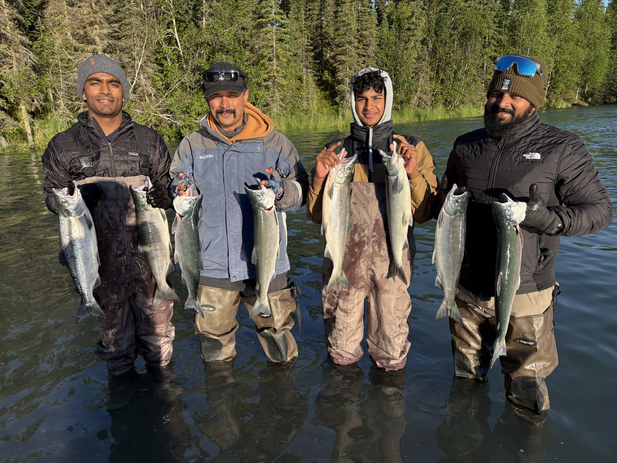 RiverRise Fishing Guides clients with a nice catch of sockeye salmon on the Kasilof River
