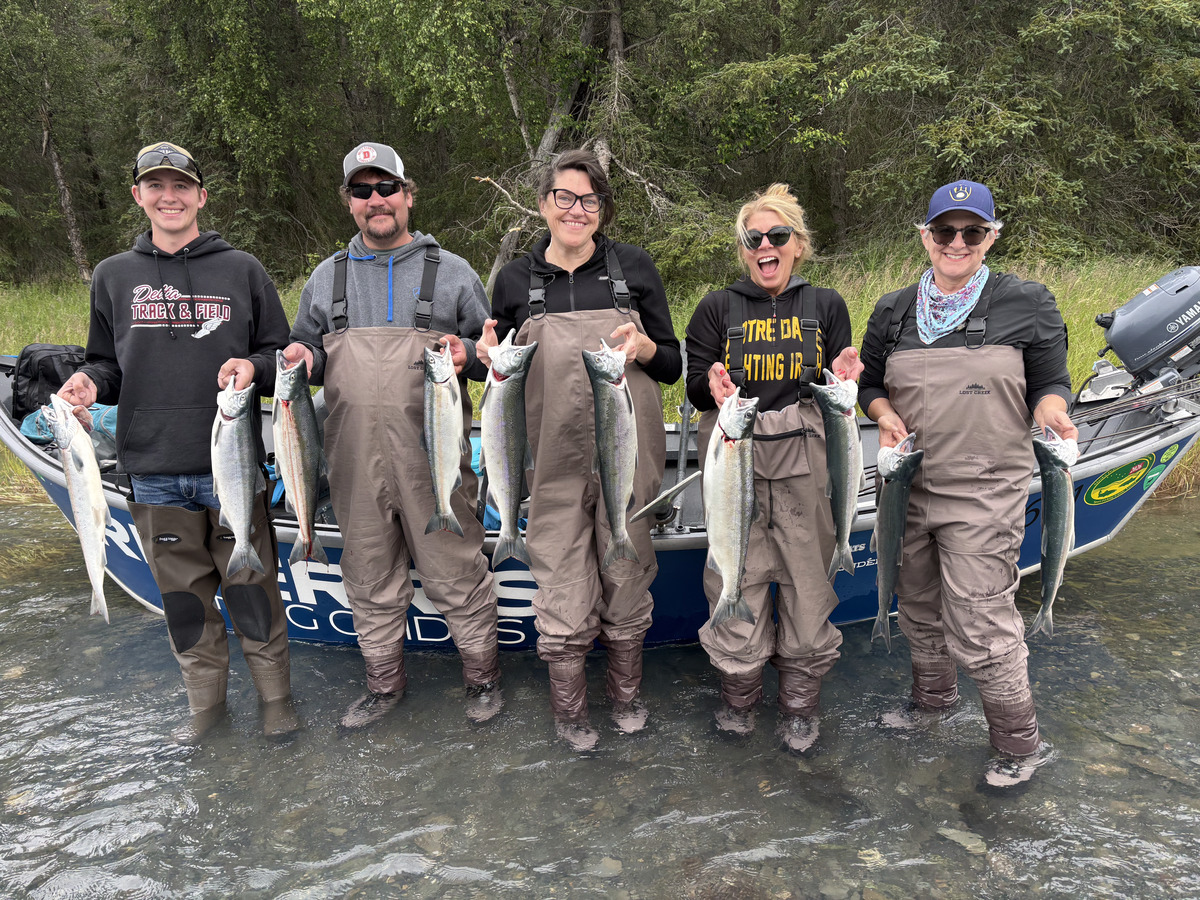 RiverRise Fishing Guides clients with a great sockeye salmon catch on a guided fishing trip